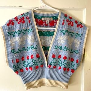 Urban Outfitters strawberry cropped sweater vest. Size large.